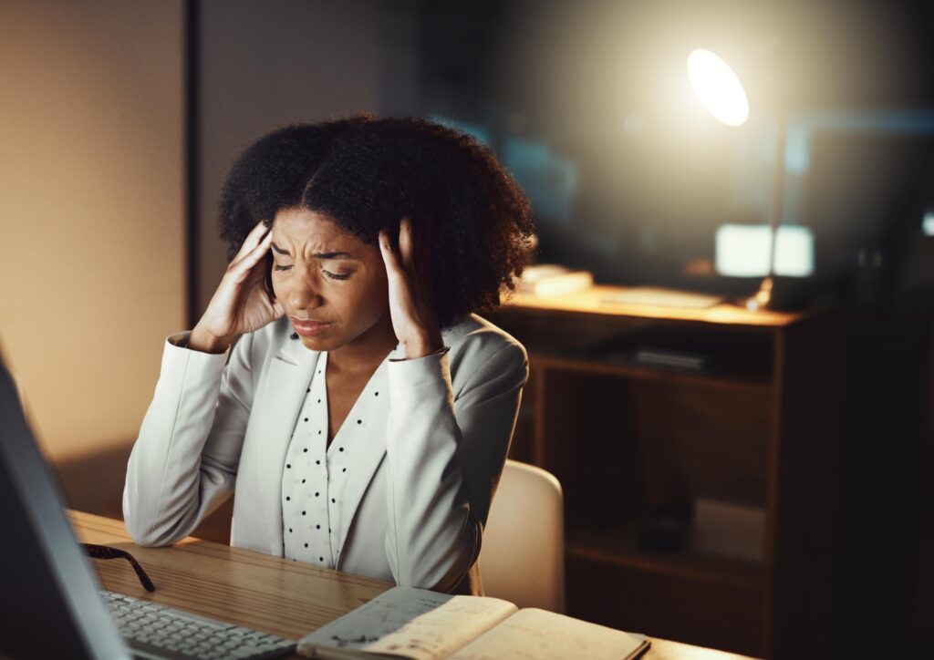 This image features a woman who appears stressed. It was used to represent coping with stress. 