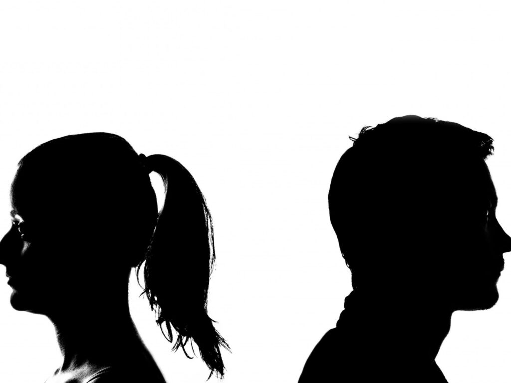 This photo is used to represent separation. The photo shows a couple who turn back to each other.