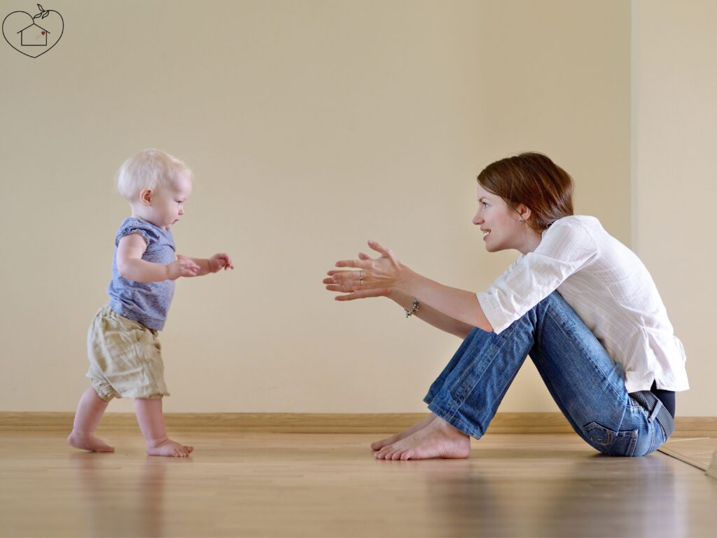 This photo is used to represent encouraging babies to walk.