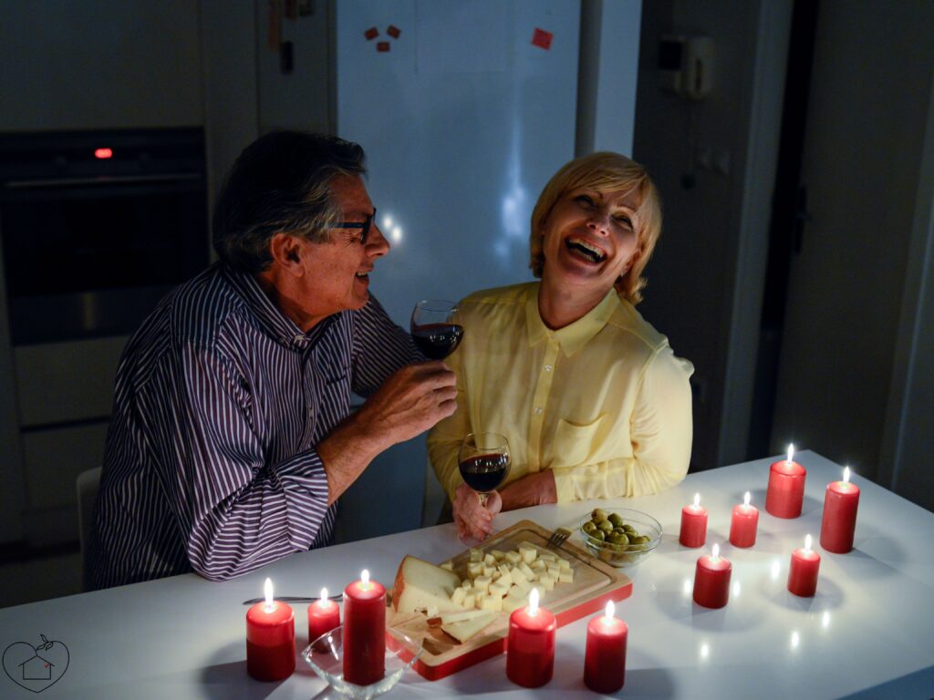 A couple drinking and smiling, symbolizing mutual respect in love.